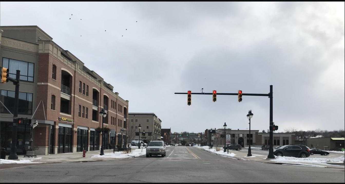 Downtown Fenton, Michigan street with historic brick buildings