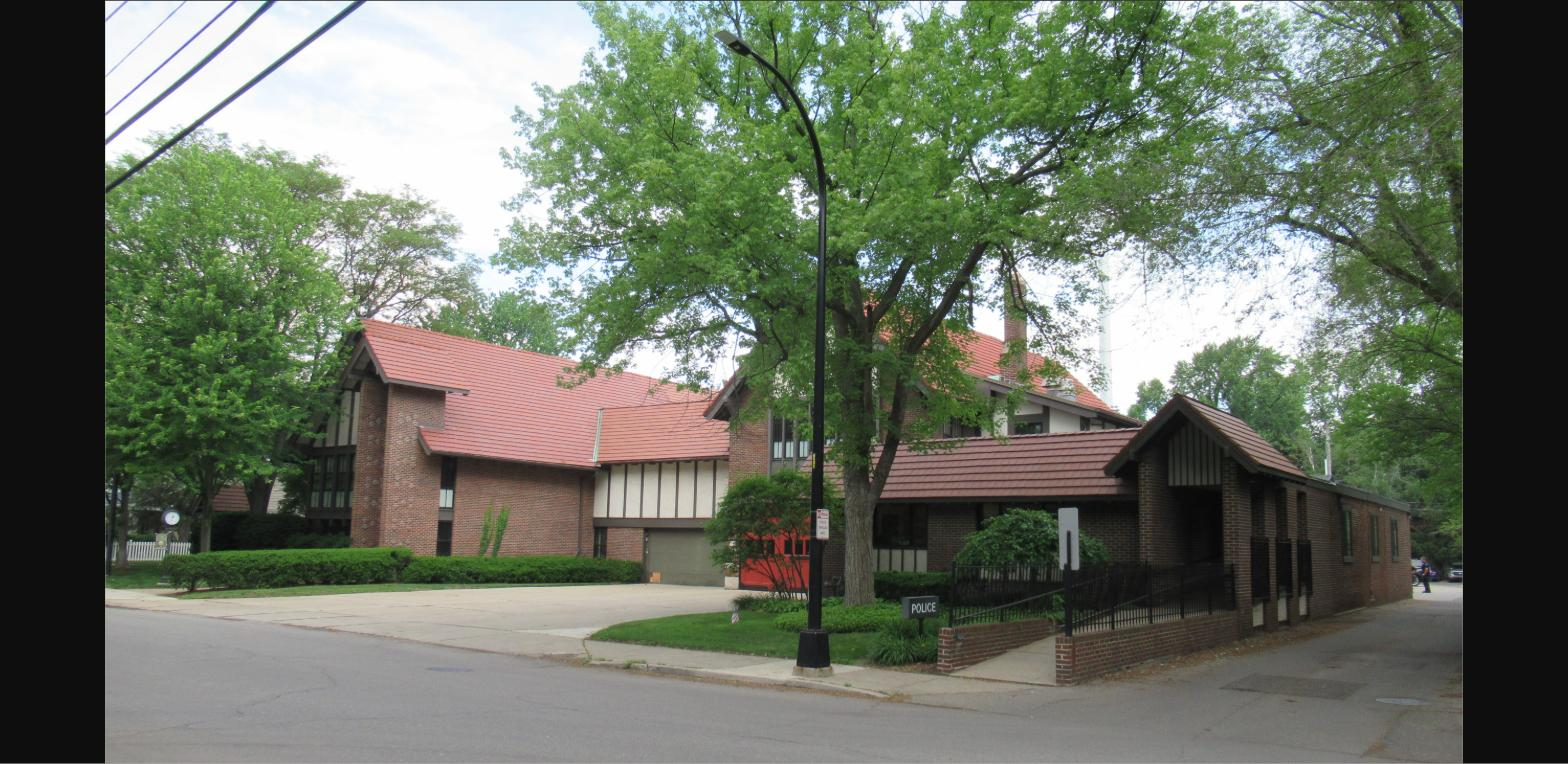Grosse Pointe Farms municipal offices building with brick and tile roof