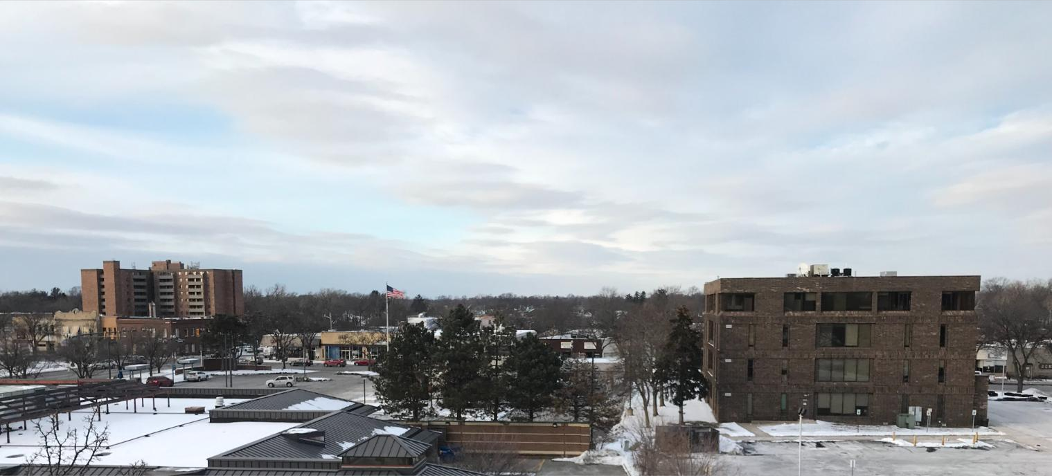 Snowy view of downtown Wayne, Michigan buildings