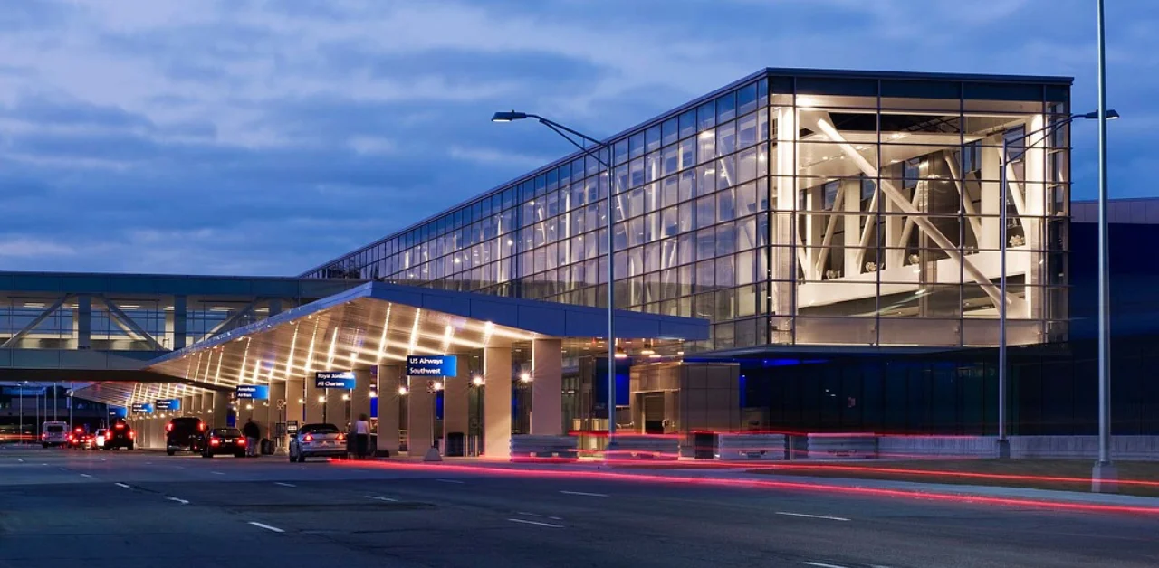 Detroit Metropolitan Airport terminal exterior at dusk